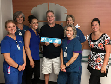Curt standing with his team of caregivers at Select Specialty Hospital, Camp Hill, PA after recovering from Guillain-Barre.